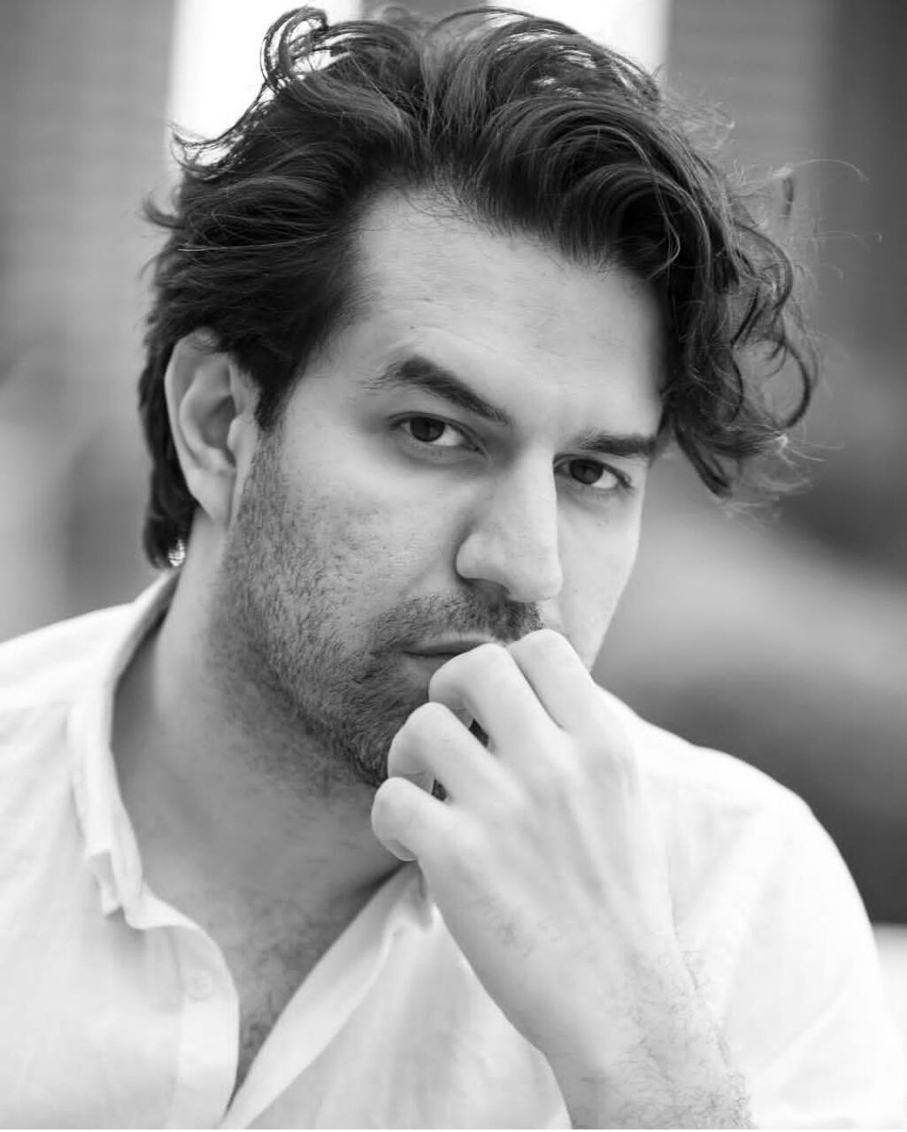 Sohrab Pournazeri in a black and white portrait